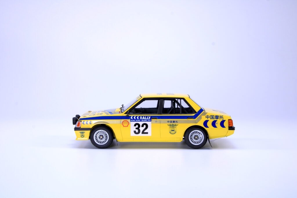 NuNu PN24032 Mitsubishi Lancer Turbo 85 Hong Kong-Beijing Rally 1/24 – obrázek 6